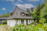 Außenansicht - Charmante 2-Zimmer-Wohnung mit fünf Garagen – ideal für Kapitalanleger oder Eigennutzer!