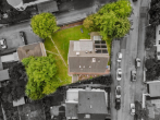 Drohnenbild - Freistehendes Mehrfamilienhaus in Top Lage: Inklusive Garten & Garage!