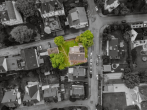 Drohnenbild - Freistehendes Mehrfamilienhaus in Top Lage: Inklusive Garten & Garage!