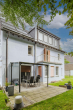 Rückansicht - Freistehendes Mehrfamilienhaus in Top Lage: Inklusive Garten & Garage!