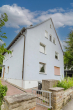 Frontansicht - Freistehendes Mehrfamilienhaus in Top Lage: Inklusive Garten & Garage!