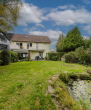 Rückansicht - Familienfreundliches Einfamilienhaus mit 6 Zimmern, Balkon und Garage!